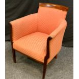 A 20th century mahogany upholstered club chair, outswept arms, tapered square legs, 76cm high.