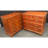 A near pair of late 20th century yew chest of drawers, rectangular top above two short drawers and