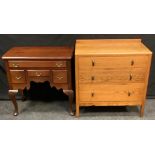 A reproduction mahogany side table, rounded rectangular top above one long and one short drawer