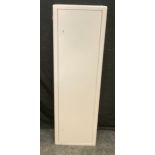 A single door metal gun cabinet, four gun capacity, 132cm high, 40cm wide, 24cm deep