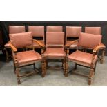 A set of eight 20th century oak dining chairs, comprising six side chairs and two carvers, leather