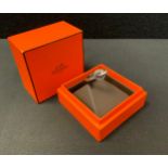 A Hermes silver ring, boxed