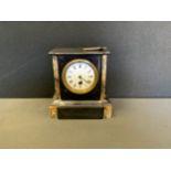 A Victorian belge noir and grey marble mantel time piece, white enamel dial, bold Roman numerals,
