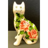 A Wemyss G Hill Pottery model seated cat, 17.5cm high.