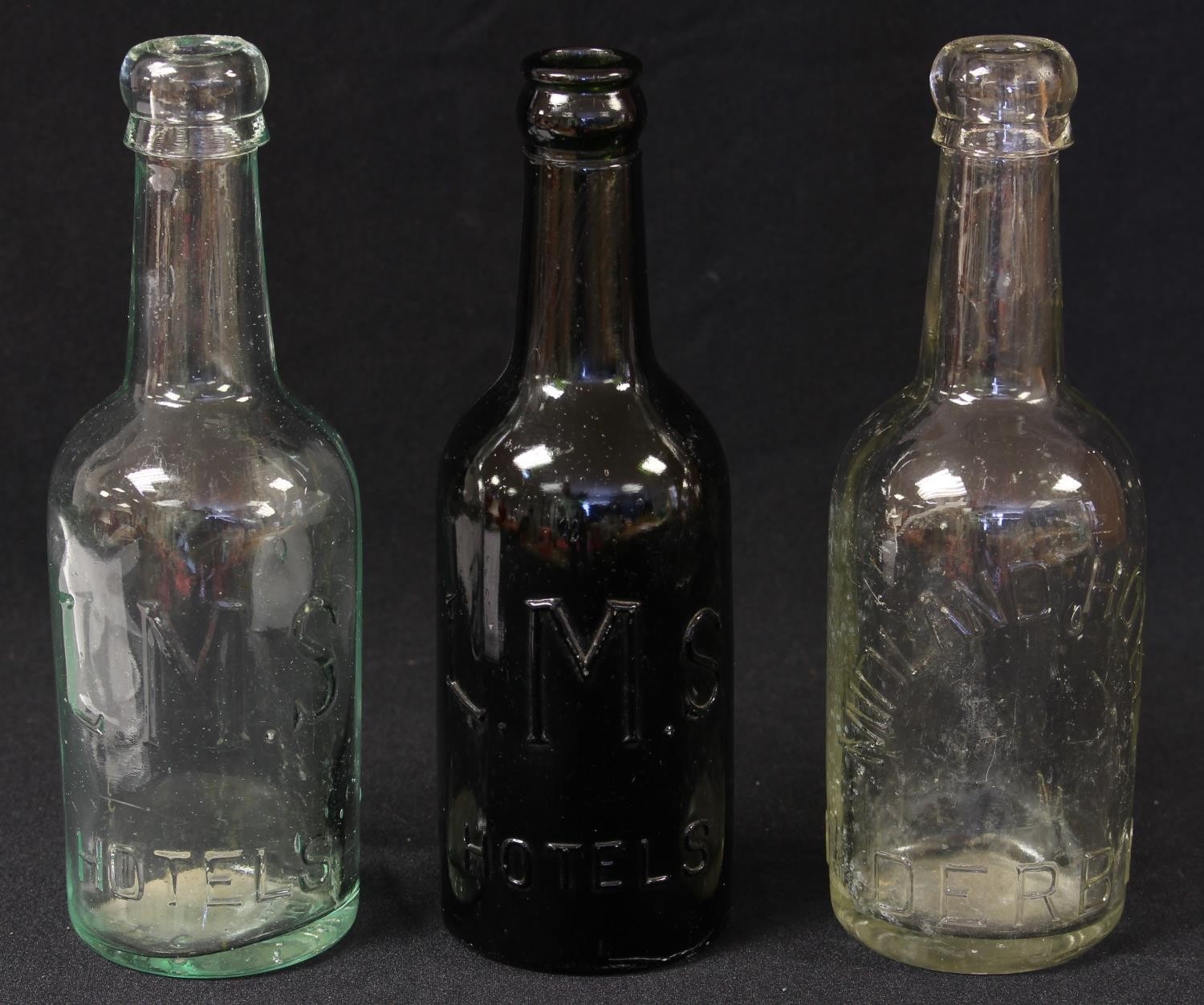 Advertising - Railwayana - Local Interest - a 19th/early 20th century clear glass bottle, Midland