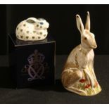 A Royal Crown Derby paperweight, Midsummer Hare, silver stopper; another, Fletchers Rabbit, silver