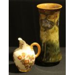 A Royal Doulton 'Art Nouveau' style tube lined vase, 24cm high and a Royal Worcester blush ivory