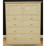 A Victorian painted housekeeper's cupboard, slightly overdsailing top above a pair of panel doors,