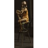Bergman, after, a bronzed figure, seated on stool