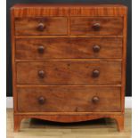 A George IV mahogany chest, flush rectangular top above two short and three long graduated