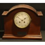 An Edwardian mahogany inlaid domed mantel clock, white enamel dial with Arabic numerals, twin