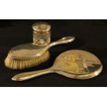 A George VI silver hand mirror and brush, composed set of plain design, Birmingham c.1940; a glass