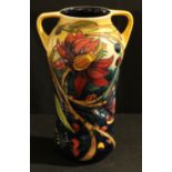 A Moorcroft 'Hartgring' pattern twin handled vase, tube lined decoration with flowers, insects and
