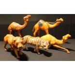 A group of 'Liberty' style leather covered camels and tigers (5)
