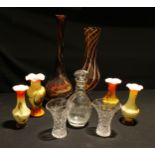 An Art Glass slender elongated vase with gold flecked spiral inclusions; a set of four cased glass