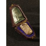 A hallmarked silver thimble in fitted case