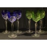 A set of six green and blue flashed hock glasses, star and sheaf cut, faceted tapering stems, 21cm