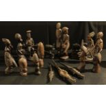 Tribal Art - African hardwood figures, in various poses; a graduated set of elephants; etc