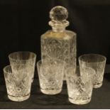 A cut glass decanter with silver presentation label, marked silver, five similar whisky tumblers