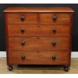 A Victorian mahogany chest, rounded rectangular moulded top above two short and three long graduated