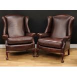 A pair of George II style office reception wingback armchairs, scroll arms, squab cushion,