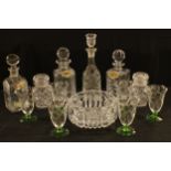 Three large decanters, with Gin and Brandy labels; a cut glass decanter; a heavy cut glass bowl; two