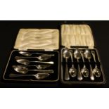 A set of six George IV silver grapefruit spoons, Sheffield 1939, 5.6oz, cased; another set