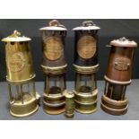 An Eccles Miners safety lamp; a Hailwood & Ackroyd Miners lamp; another; a Hockley lamp; etc (5)