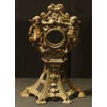 A substantial Victorian pocket watch stand, cast with scantily clad putti, Rd.No.638996, c.1890