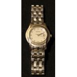 A lady's Gucci watch, the mother-of-pearl dial set with diamonds, diamond indicators, date aperture,