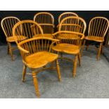 A set of four John Parkin stick back windsor chairs; another pair (6)