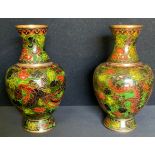 A pair of Japanese Cloisonné vases, decorated with a Dragon and Cockatrice upon green floral ground,