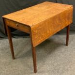 A 20th century oak drop-leaf table, rectangular top above a short drawer, tapered square legs,