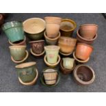 Garden planters and plant pots; 24 plant pots, various sizes and glazes, the largest measuring