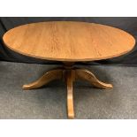 A Fox Country Furniture dining table, circular top, turned support, 74cm high, 146cm diameter.