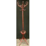 A 20th century mahogany bentwood coat stand, 195cm high.