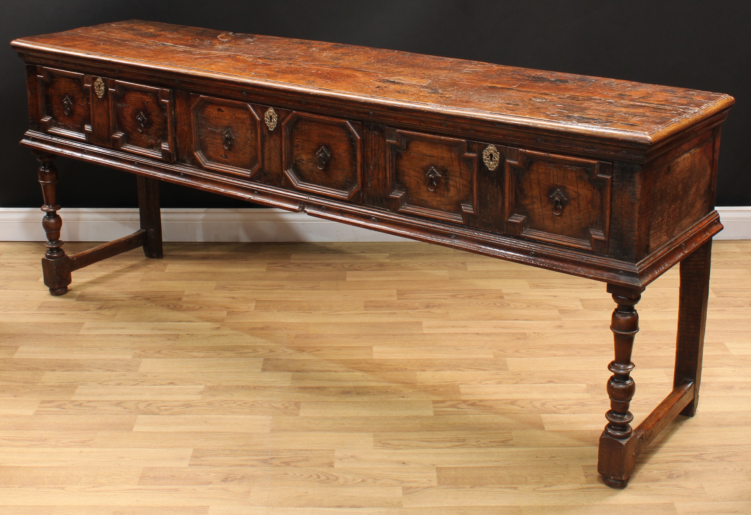 A Charles II design oak block front low dresser, oversailing plank top with moulded edge above three - Image 5 of 6