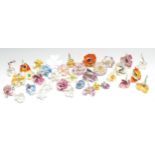 A collection of porcelain flowers, in the Continental Rococo taste, various varieties and colours,