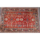 A Middle Eastern rug, worked in the traditional manner, 152cm x 102cm