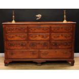 A George III oak and mahogany Lancashire chest, hinged rectangular top with moulded edge enclosing