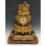 A 19th century French Rococo Revival ormolu mantel clock, 7cm white enamel chapter inscribed Le