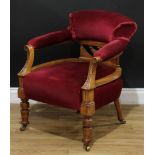 A late Victorian walnut club or tub chair, curved back, shaped and pierced mid rail panel, the