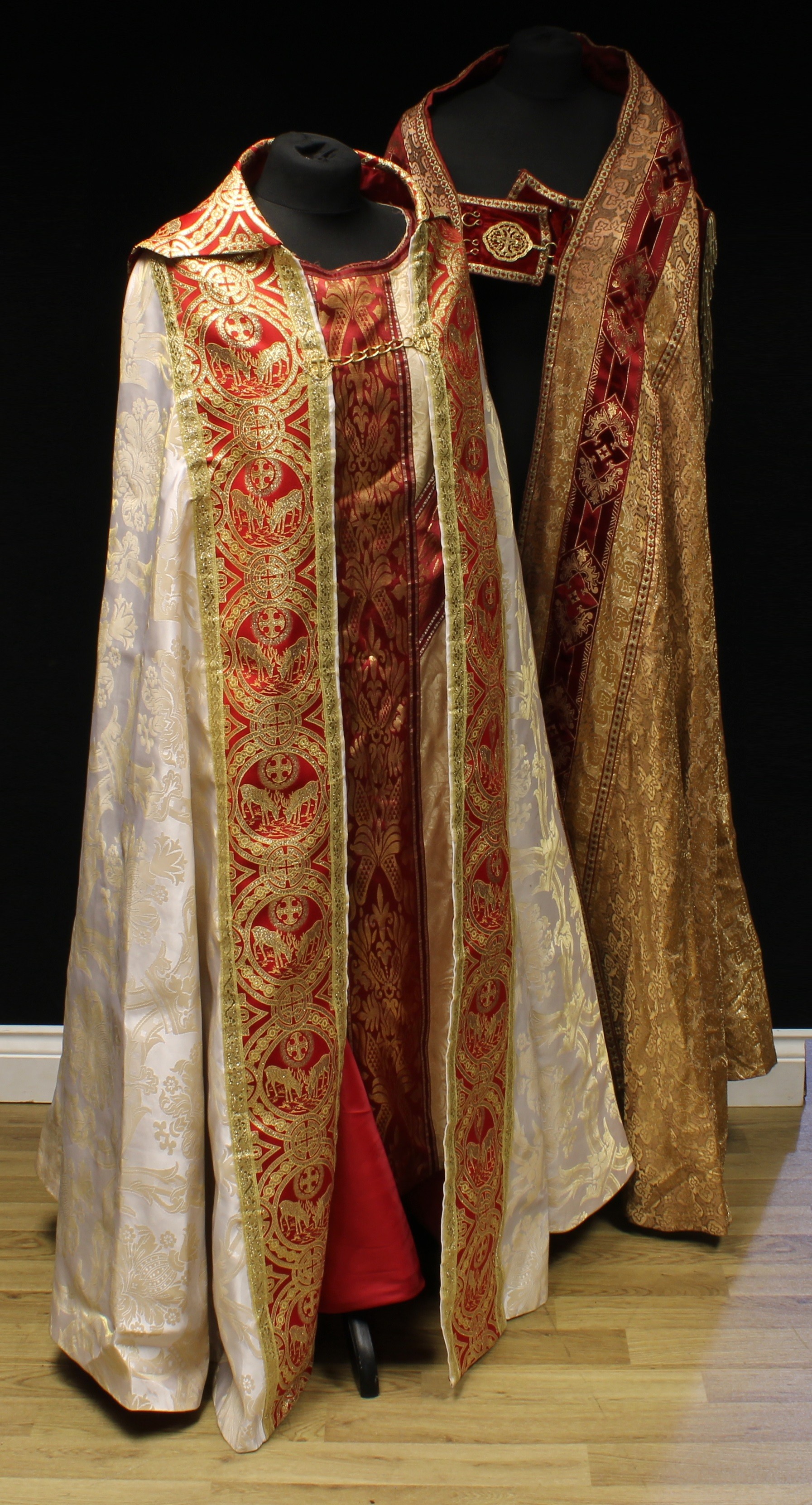 Ecclesiastical Liturgical Vestments - a cope, richly embroidered in gilt threads on red stain and