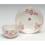 A Worcester tea bowl and saucer, painted with puce and gilt flowers, c.1790