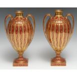 A pair of Royal Crown Derby pedestal ovoid two handled vases, decorated with alternating vertical