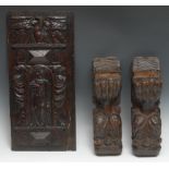 A 17th century oak panel, carved in relief with a figure within an arch, crested and flanked by