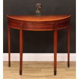 A George III mahogany demilune card table, folding top enclosing an inset baize lined playing