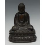 A Japanese bronze figure of Amida Nyorai (Amida Buddha), raised on a lotus cast base, late 19th/