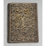 A Victorian silver book cover, cast in the Renaissance Revival taste with putti amongst scrolling
