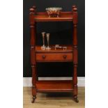 A Victorian mahogany three-tier buffet, of small proportions, three-quarter gallery, turned